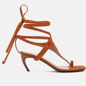 "Nova" thong sandal in cigar suede, heel height 65mm. Made in Italy.